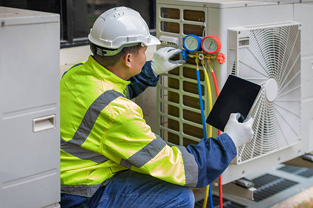 Professional Hvac technician working in Cooksville, MD